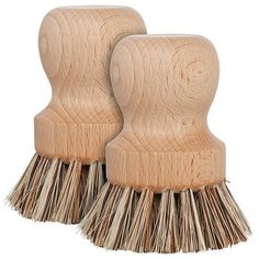 two wooden brush heads with white bristles