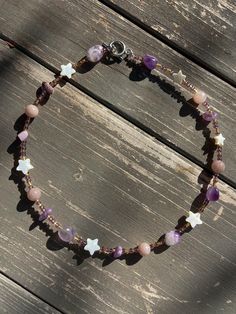 This beautiful necklace is made with a variety of glass beads, seed beads, jade gemstone beads, and natural amethyst beads Necklace is 16 and 18 inches long Please message us if you have any questions!! Amethyst Beaded Necklace, Purple Beaded Necklace, Gold And Purple, Necklace Amethyst, Jade Gemstone, Necklace Stone, Stone Beaded Necklace, Amethyst Beads, Amethyst Purple