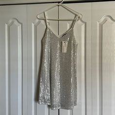 Brand New, Never Worn With Tag Attached. Purchased From An Online Boutique, Size Small. Silver Sequins On Front And Back. Light Weight Material, Adjustable Shoulder Straps. Silver Sequin Mini Dress, Sequin Slip Dress, Pop Style, Back Light, Bow Detail Dress, Trapeze Dress, Birthday Dress, Mod Dress, Sequin Mini