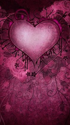 a pink heart with black swirls and vines on it's side, against a dark background