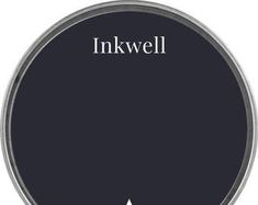 the inkwell logo on a black background