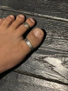 "Fully Custom Made to order Toe ring for the Big Toe or Thumb Ring. This ring is made out of 1/16\" (1.58mm) thick Aluminum and 1/4\" (6.35mm) thick. Very lightweight and maintenance free. I currently only offer this ring in adjustable which is open ended. You can provide me with the US toe ring size or a circumference measurement using the dental floss method.  Currently pictured is finished in natural satin, but also I offer high polished finish.  Any questions or custom requests please just l Mens Toe Ring, Dental Floss, Thumb Ring, Custom Ring, Toe Ring, Open Ended, Thumb Rings, Toe Rings, Custom Rings