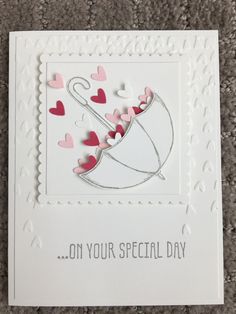 a card with hearts on it that says, on your special day