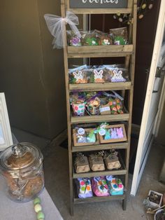 a wooden shelf filled with lots of treats