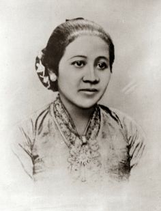 an old black and white photo of a woman