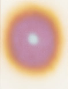 an orange and yellow circle is in the middle of a white square with a light blue center