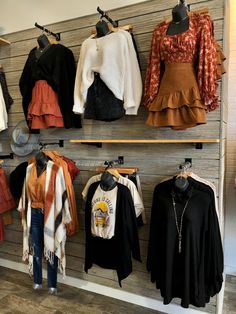 clothing is displayed on display in a store