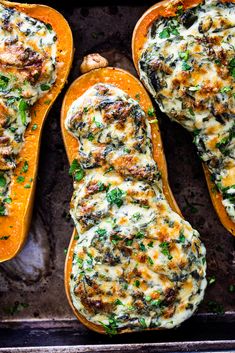 three stuffed butternut squash with cheese and herbs