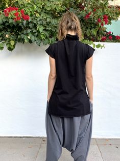 Black Relaxed Fit Top For Festival, Black Cotton Festival Tops, Black Cotton Tops For Festival, Casual Black Funnel Neck Top, Black Funnel Neck Top For Streetwear, Black High Neck Top For Streetwear, Black High Neck Cotton Top, Resort Loungewear, Cyberpunk Style Black Cotton Pants