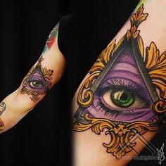 two arm tattoos with an eye and ornate design on the arms, both showing different colors