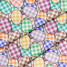 colorful plaid fabric with balloons all over it