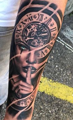 a man's arm with a clock and face tattoo on the side of his leg