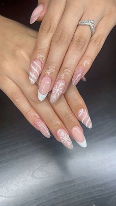 #winternails #nailsofinstagram #almondshapenails White Snowflake Nails Almond, Christmas Nail Sets Almond, Pink Chrome Snowflake Nails, Pink Snow Flake Nails, Baby Pink Winter Nails, Pink Snowflake Nails Acrylic, Mail Inspo Winter, Pink And White Snowflake Nails, Pink Nails With Snowflakes