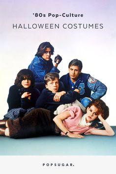 the cast of'80s pop - culture halloween costumes, from left to right, are posing in front of an advertisement for popsugaar