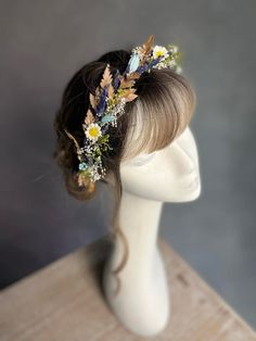 Meadow flower hair crown. The flower hair crown is made of artificial/fabric flowers, preserved flowers, leaves, grass and other trinkets used for arranging. Matching hairpins: https://www.etsy.com/uk/listing/1212143081/meadow-daisy-flower-hairpins-set-of-hair?click_key=201ba32ea6aeba092e46cb6ab42c0c0b15144714%3A1212143081&click_sum=2f24b686&ref=shop_home_active_5&sts=1 Matching hair comb: https://www.etsy.com/uk/listing/1198631318/meadow-daisy-and-lavender-flower-hair?click_key=5ccb072754b07abb Wildflower Crown, Daisy Crown, Hobbit Wedding, Crown Aesthetic, Wedding Halo, Flower Crown Hairstyle, Bridal Flower Crown, Meadow Flowers, Wedding Wreaths