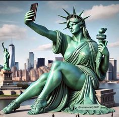 the statue of liberty is holding a cell phone