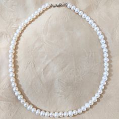 Genuine White Freshwater Pearls Necklace Length: 16" (18" Also Available For +$5) Pearl Size (Average): 7mm Silver Plated Lobster Clasp Closure Comes With Silver Gift Pouch Pearls Necklace, Freshwater Pearl Necklace, White Freshwater Pearl, Gift Pouch, Freshwater Pearl Necklaces, Silver Gifts, Pearl Size, Necklace Length, Lobster Clasp