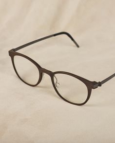 The deep level of texture and detail in a wooden front creates a captivating impression. This eyewear style is made from a unique combination of wood, buffalo horn, and titanium. Horn Rimmed Glasses, Wooden Glasses, Titanium Glasses Frames, Titanium Glasses, Luxury Eyewear, Square Glasses, Eyewear Fashion, Medium Brown, The Deep