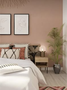 a bedroom with pink walls and white bedding