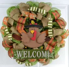 a welcome wreath with a turkey on it