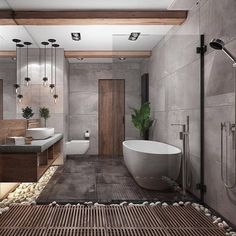 a bathroom with a bathtub, toilet and sink in it's center area