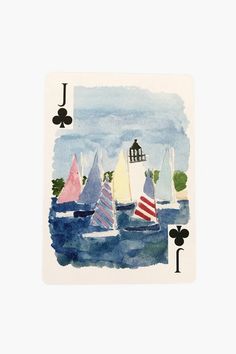 a playing card with sailboats on the water