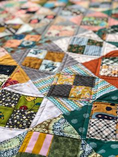 a close up view of a patchwork quilt