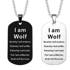 two dog tags with the words i am wolf and i am survivor on them, one is