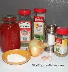 spices and seasonings on a white counter top