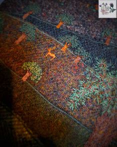 the carpet is very colorful and has little animals on it's back side,