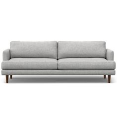 a gray couch with wooden legs on a white background