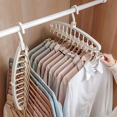 a rack with clothes hanging from it's sides