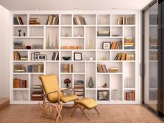 a chair and ottoman in front of a bookshelf