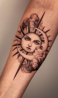 a sun and moon tattoo on the arm