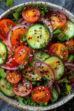 Get a fresh perspective on a vibrant garden salad featuring crisp green lettuce, juicy cherry tomato halves, refreshing cucumber slices, and delicate red onion rings. This delightful mix is gently tossed in a homemade Dijon mustard vinaigrette, perfectly embodying the spirit of a nutritious and speedy side dish. End Of Summer Salad Real Simple, Salad Recipes With Tomatoes, Cucumber Recipes Dinner, Fresh Side Salad, Green Lettuce Salad Recipes, Few Ingredient Salads, Summer Tossed Salad Recipes, Simple Fresh Recipes, Lettuce And Tomato Salad