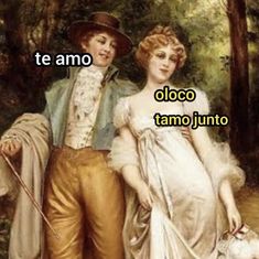 two people standing next to each other in front of trees and the words te amo