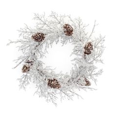 a wreath with pine cones and branches covered in snow on a white background stock photo