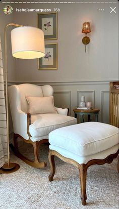 a white chair and ottoman in a room