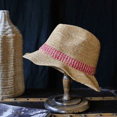 We take pride in the craftsmanship that goes into every Unisex Raffia Straw Fedora. Meticulously handwoven by skilled artisans, the premium raffia straw lends a unique, textured finish that’s both visually appealing and comfortable to wear. The robust construction ensures your Fedora retains its pristine condition over time, promising a durable accessory that doesn’t compromise on styleAn ideal gift for her!Specifications-Material: 100% raffia straw-Size: Head size 55-59 cm -Brim:5 cm-Height:10c