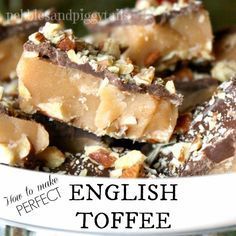 some pieces of chocolate and nuts on a white plate with the words english toffee