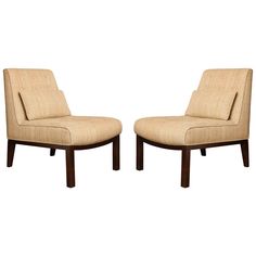 a pair of chairs sitting next to each other