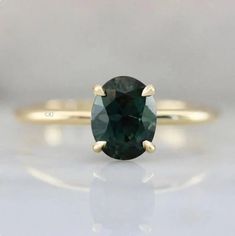 -: Made To Order Details :- Oval Cut Teal Sapphire Ring, Teal Sapphire Solitaire Ring, Blue Green Sapphire Ring, Promise Ring, September Birthstone, Anniversary Gift ✔  Metal : 925 Sterling Silver, ✔ Gemstone : Natural Teal Sapphire  ✔ Shape : Oval  ✔ Size : 7x9 mm ✔ Ring Size :- 3-12 US ✔ Finish : Yellow gold plated, Rose gold plated and White Gold Plated ✔  Ready To Ship in - 5 to 7 business Working day. ✔  For Fast Delivery Kindly Pay 30.00 USD Extra ✔  All the jewelry in my store is handmade Blue Green Sapphire Ring, Teal Sapphire Ring, Lost Horizon, Green Sapphire Ring, Sapphire Solitaire Ring, Oval Cut Ring, Blue Green Sapphires, Teal Sapphire, Sapphire Solitaire