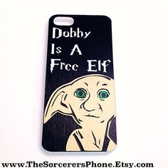 a wooden phone case with an image of a dog and the words dobby is a fro eff on it