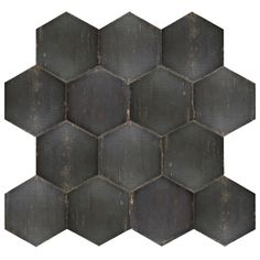 an old black hexagonal tile pattern