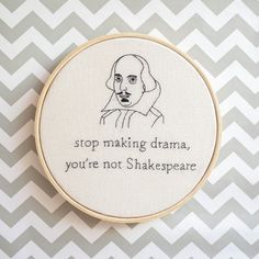 a cross stitch hoop with shakespeare quote on it