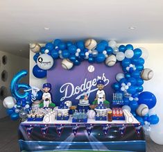 a dodgers themed birthday party with balloons and decorations