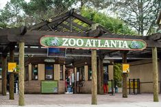 the zoo atlanta entrance with people standing outside