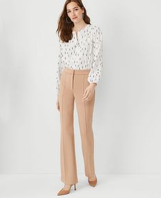 Elevate your wardrobe with the Petite Pintucked Trouser Pant in Double Knit from Ann Taylor. These trousers are the epitome of comfort meets elegance, crafted in a stretchy, wrinkle-resistant fabric that ensures you stay chic without sacrificing comfort. Perfect for mixing and matching within your wardrobe, these pants are a versatile staple.

- Size: Petite 10
- Color: Natural Camel
- Gender: Female
- Material: 78% Polyester, 15% Viscose, 7% Spandex; Lining: 100% Polyester
- Fit: Regular fit, l Dress Slacks For Women, Petite Suits, Professional Pants, Slacks For Women, Knitted Suit, Stylish Pants, Professional Attire, Double Knit, Womens Dress Pants