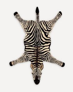 a zebra's head is shown with its legs spread out in the shape of a star