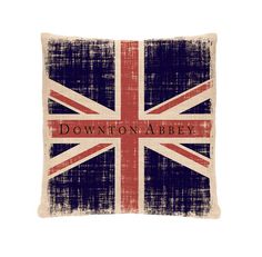 a pillow with the words downton abbey on it in red, white and blue